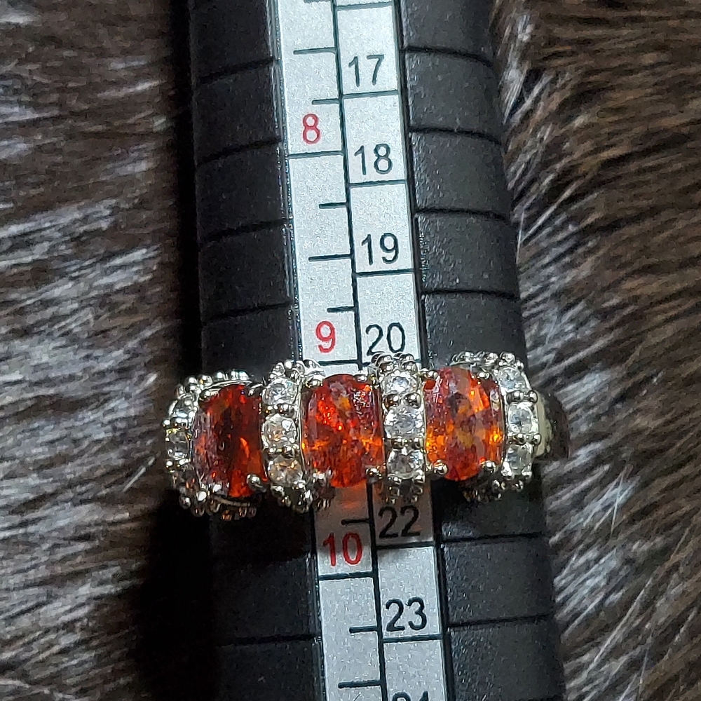 Sz 9.5 Orange and white sapphire ring